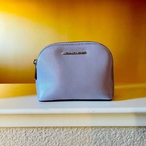 NWOT - Michael Kors lilac cosmetic bag.